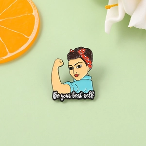Broche d'infirmière en émail doré avec slogan 'Be your best self' et motif de Rosie la riveteuse