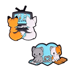 Cute fox and cat gamer enamel pins set in a heartwarming gaming companion style