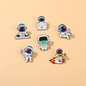 Detailed set of 6 cartoon astronaut enamel pins in various music and space poses