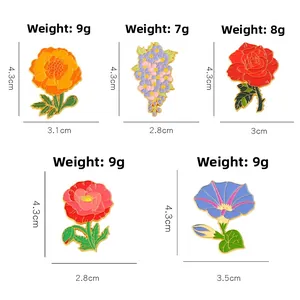 Tabella dettagliata di dimensioni e peso per spille floreali in smalto con iris e rose