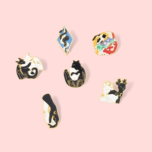 Enamel pin set featuring dragon, koi fish, cat and moon designs with gold-plated finish
