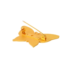Back view of colorful butterfly alloy brooch with golden finish and safety pin clasp