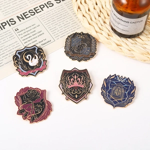 Five-piece academy style enamel badge pins featuring crests for JK uniforms and lapels