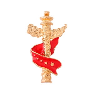 Golden Chinese Huabiao pillar brooch with red enamel and stars on white background