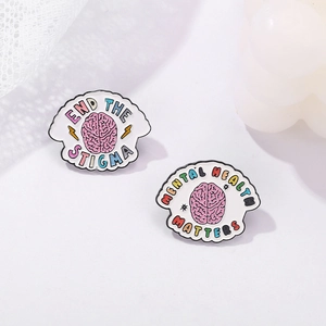 Mental health awareness enamel pins with colorful brain design and positive slogans