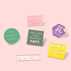 Set of six colorful geometric enamel pins featuring humorous English quotes and math formulas