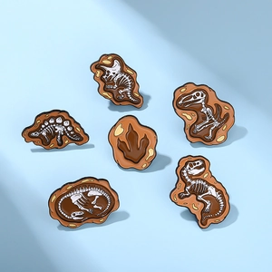 Detailed set of six dinosaur fossil enamel pins featuring T-Rex and Triceratops skeletons