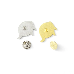 Cartoon whale enamel pins set showing gold and silver metal textures with butterfly clasp