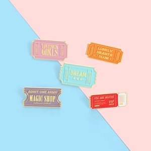 5-piece set of colorful enamel stamp pins featuring retro ticket designs and text