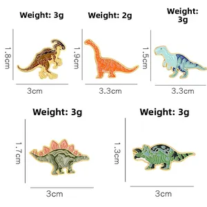 Tableau des tailles détaillé des broches dinosaures colorées avec dimensions et poids précis