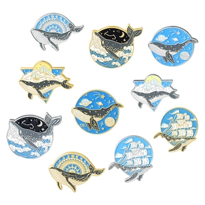 Whale enamel pins set with ocean waves, stars, and sailing boat creative designs