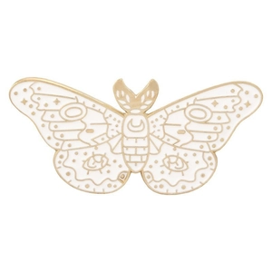 Cute white enamel moth brooch with gold trim featuring moon and star patterns