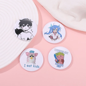 Close-up of set of four round cartoon badges featuring various trendy pop culture designs