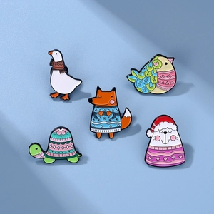 Detailed set of 5 cartoon animal enamel pins featuring fox and goose on blue background
