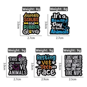 Detail of colorful enamel veterinary pins showing precise sizes and slogan designs
