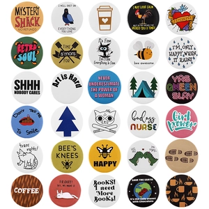 Set of 30 round tinplate button pins with diverse cartoon illustrations and quotes