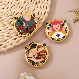 Macro shot of Spy x Family enamel pins set with Anya, Loid, and Yor figures on beige mat