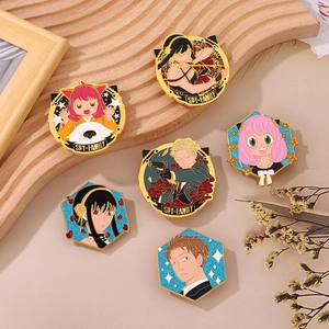 Set of 6 Spy x Family enamel pins featuring Anya, Yor, and Loid on wooden tray