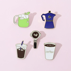 Five-piece set of cartoon coffee theme enamel pins on a soft pink background