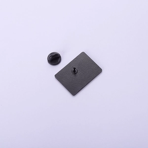 Detail view of the black nickel metal brooch back with rubber pin clutch accessory