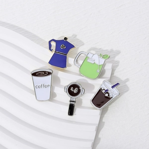 Set of 5 minimalist coffee and tea enamel pins including moka pot and cups on white stand