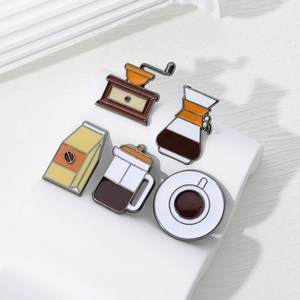 5-piece warm tone coffee enamel pin set featuring grinder and moka pot designs