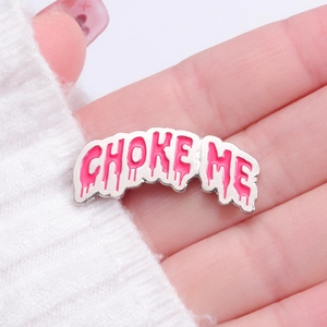Pink enamel Choke Me letter brooch pin with silver metal edge in melting drip design