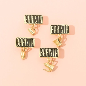 Golden Barista enamel brooch set with coffee bean cup and kettle charms on pink base