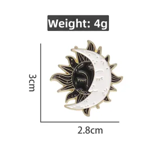 Detail view showing a 4g weight and 3cm x 2.8cm dimensions for the sun and moon brooch pin