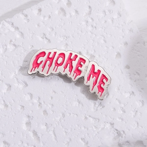 Pink enamel Choke Me metal badge brooch with liquid texture drip effect on stone