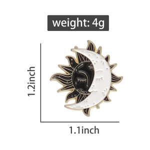 Detail view showing dimensions of the sun and moon enamel pin: 1.2 by 1.1 inches