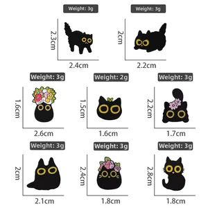 Detailed view of black cartoon cat enamel pins showing precise weights and dimensions