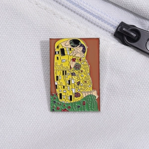 Artistic rectangular enamel brooch featuring Gustav Klimt The Kiss on white canvas bag