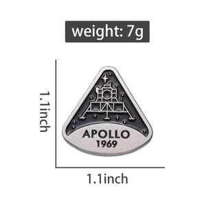 Detail view of Apollo 1969 moon landing mission souvenir pin with 1.1 inch size specs