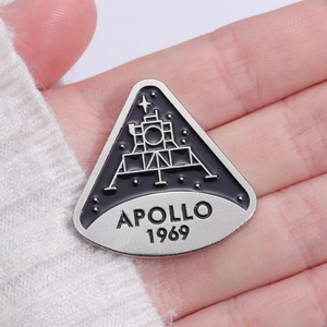 Vintage Apollo 11 moon landing enamel pin badge featuring 1969 lunar module design