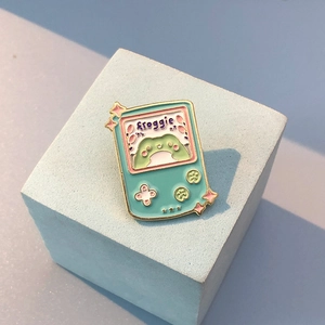 Cute cartoon mint green frog game console enamel brooch with golden plating finish
