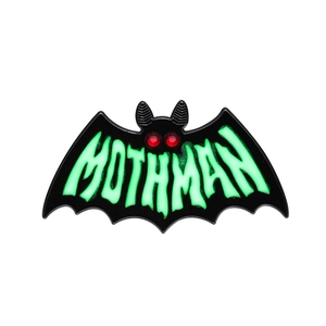 Glow-in-the-dark Mothman enamel pin with red eyes and green wings on a white background