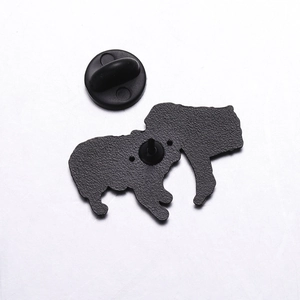 Detail of creative cartoon animal badge back with secure black rubber butterfly clutch