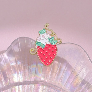 Cute bunny in red strawberry enamel brooch with gold vine frame on shell tray