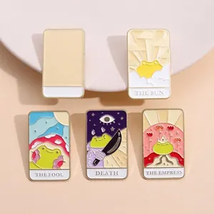 Set of 5 creative tarot frog enamel pins with cute cartoon king and sun designs