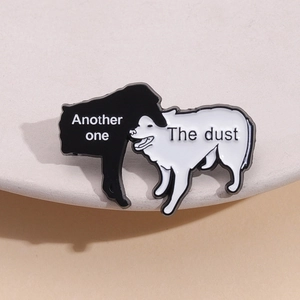 Funny enamel pin featuring black and white Border Collies with Another One Bites the Dust text
