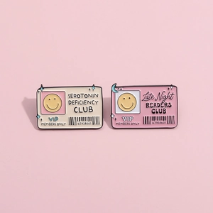 Enamel badges with VIP labels for Serotonin Deficiency and Late Night Readers Club