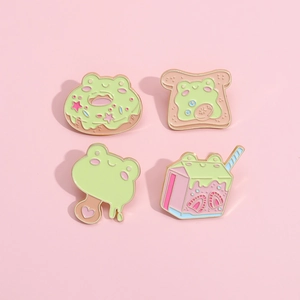 Set de cuatro pines de esmalte de ranas bonitas con temática de pan, leche y dulces