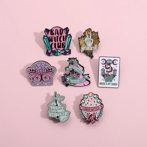 7pcs gothic witch enamel pin set with skull butterfly and wizard hat on pink backdrop