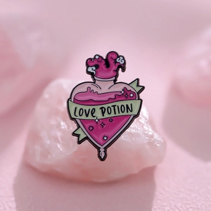 Pink heart-shaped enamel love potion pin on crystal stone, stylish metal badge brooch