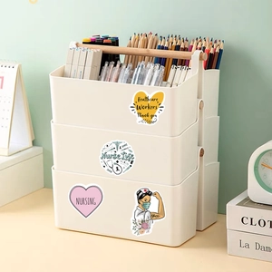 Detail of waterproof nurse life stickers decorating a cream stationery organizer with pens