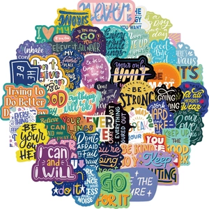 Macro shot of colorful waterproof inspirational quotes stickers for laptops and luggage