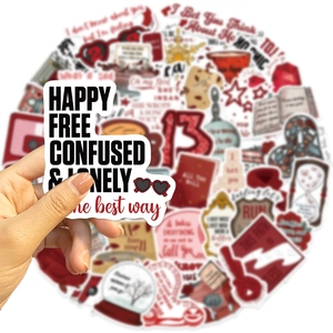 Close-up of waterproof art stickers with lyrical phrases and autumn aesthetic designs