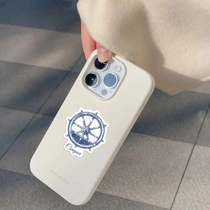Detail of cream phone case featuring a blue vintage nautical helm and Conquer text