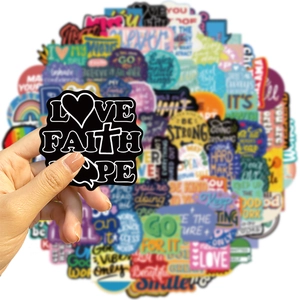 Close-up of waterproof Love Faith Hope sticker with hand showing size and matte texture